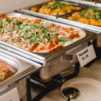 catering dishes filled with Italian food