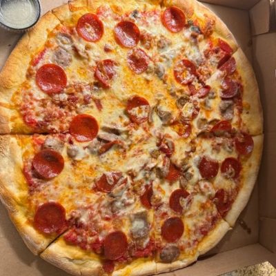 meat lovers pizza packed in box