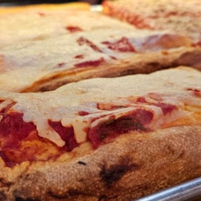 square cut cheese pizza by the slice