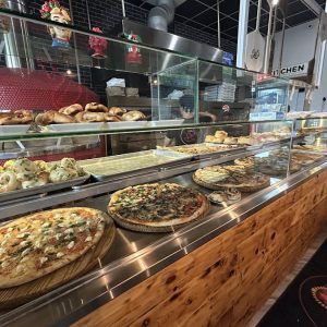pizzas on display in Sal's Pizza Bar Dr. Phillips
